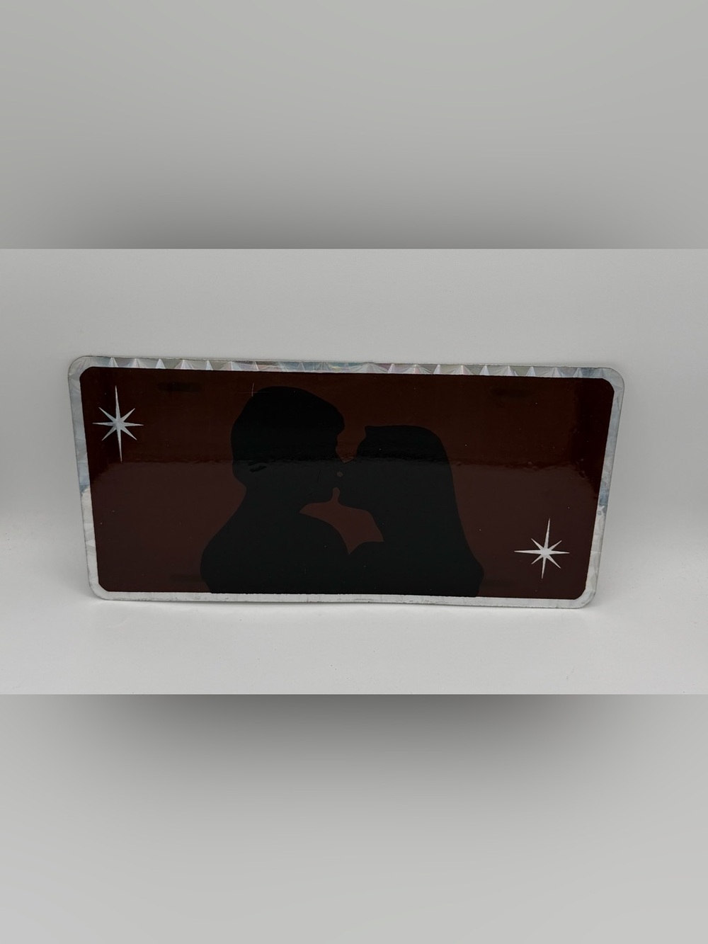 Silhouette Couple Art - Black & Brown Kiss License Plate